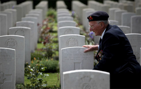 Peter Smoothy, 86, who was a leading writer in the Royal Navy on D-Day visits the grave of a fallen comrade on June 6, 2010 in Bayeux, France. Across Normandy several hundred of the surviving veterans of the Normandy campaign are commemorating the 66th anniversary of the D-Day landings which eventually led to the Allied liberation of France in 1944.